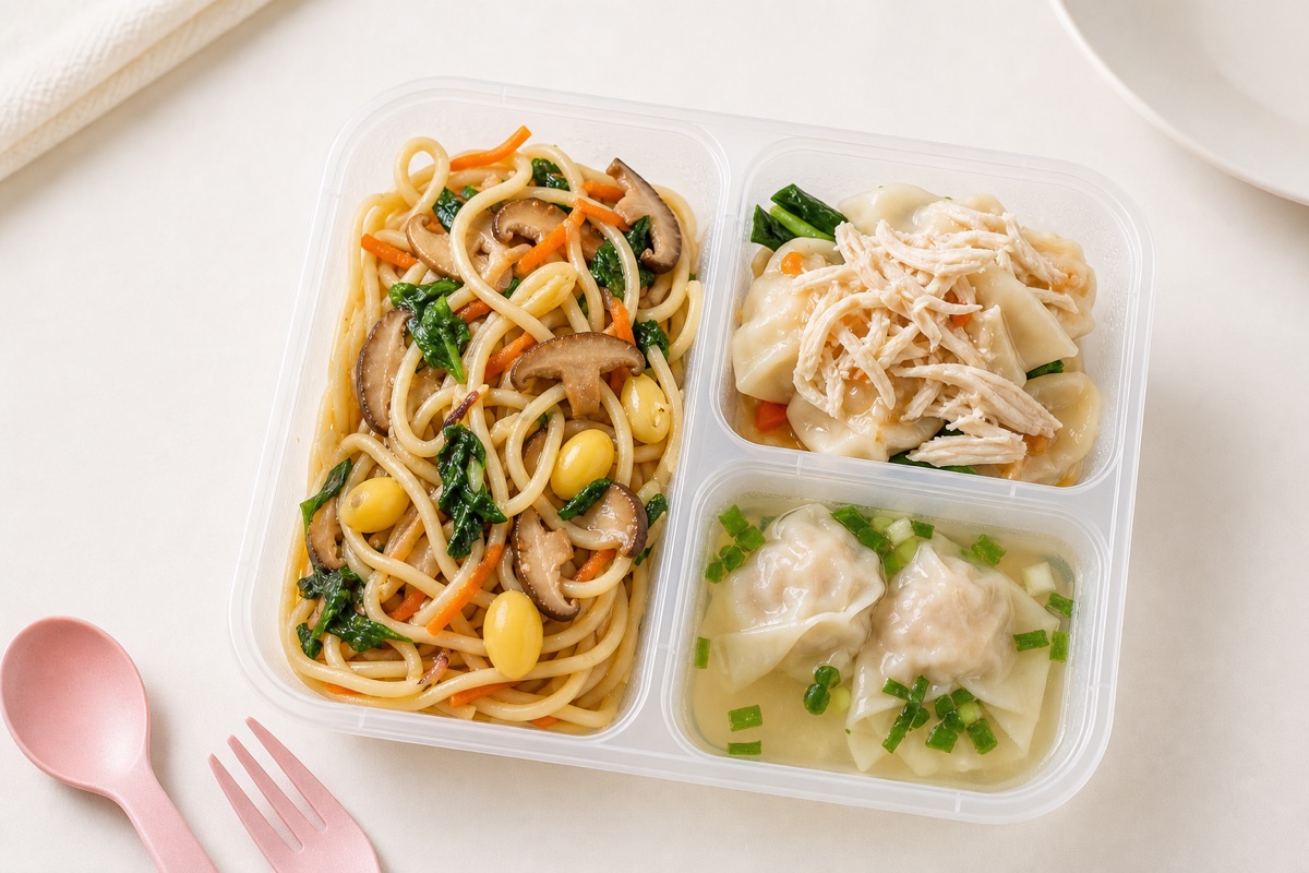 Udon noodles with wontons and clear soup in a My Little Boss meal tray